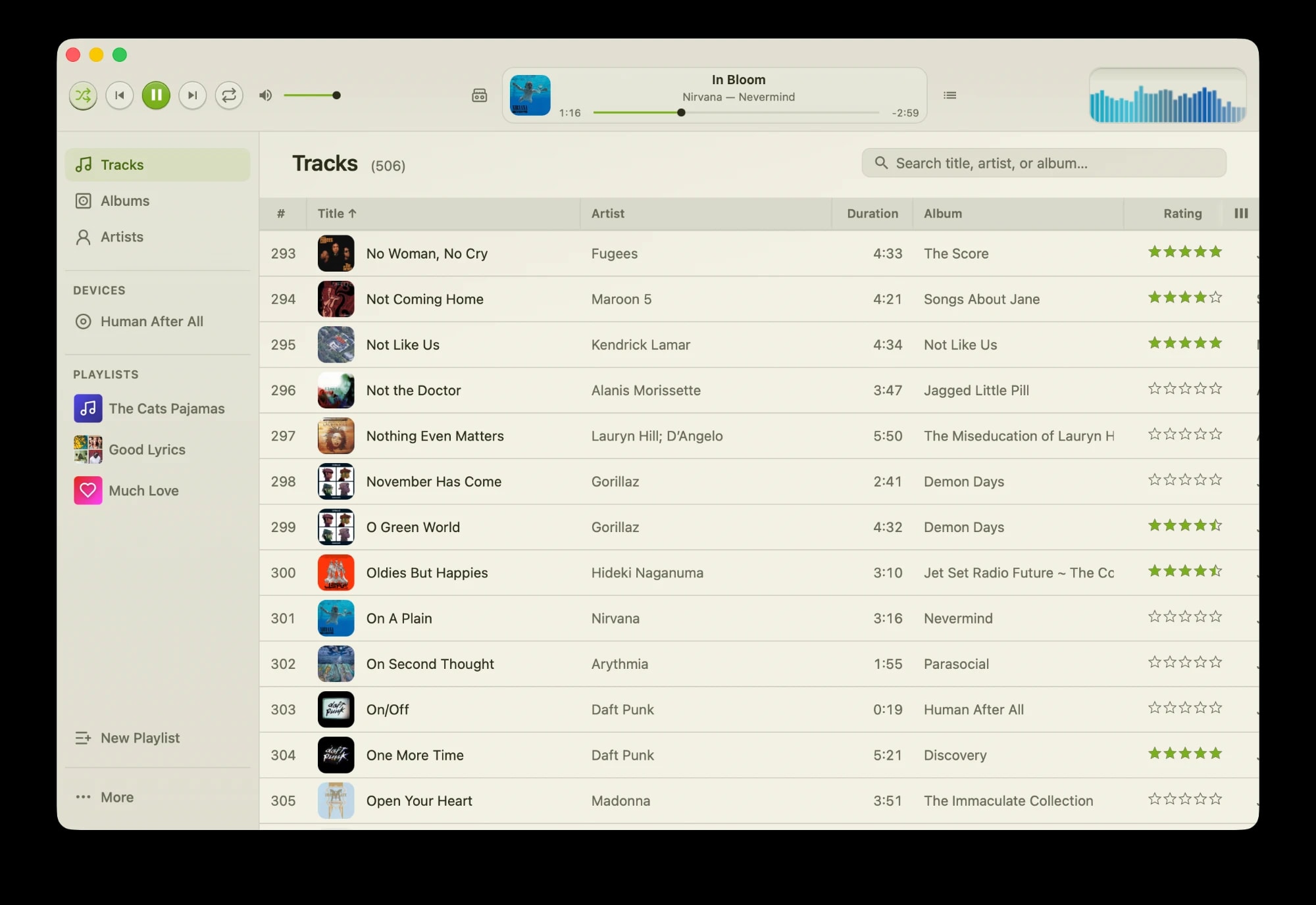 Spiral music library showing a track list with album art, ratings, and a now-playing bar